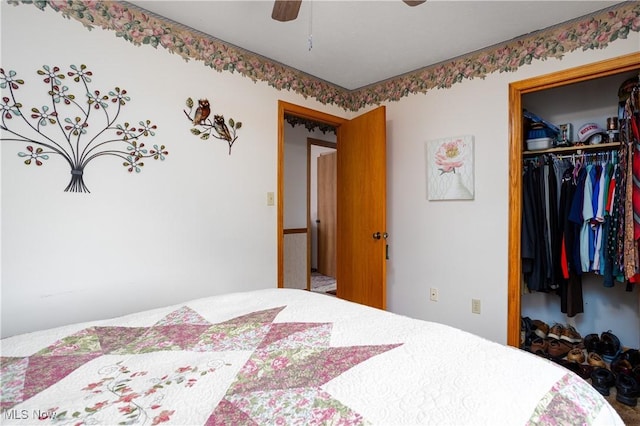 bedroom with a spacious closet, a closet, and ceiling fan