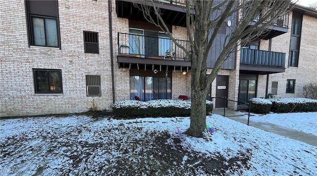 view of snow covered property