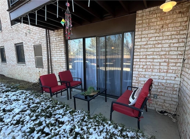 view of snow covered patio