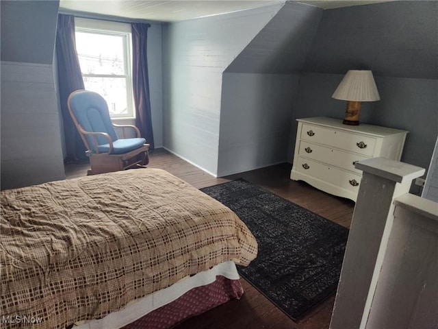 bedroom with wood finished floors