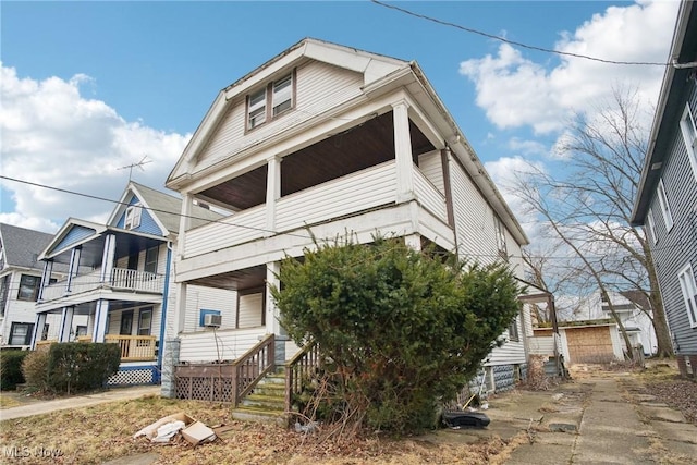 view of front of property with a balcony