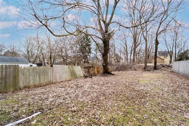view of yard with fence