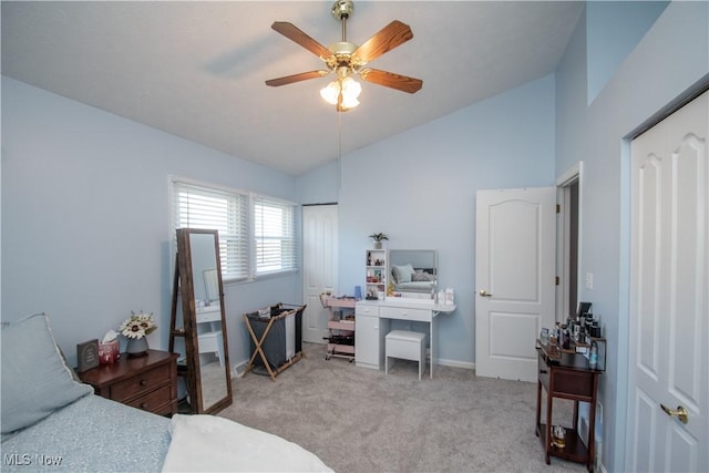 bedroom featuring ceiling fan, baseboards, lofted ceiling, and carpet floors