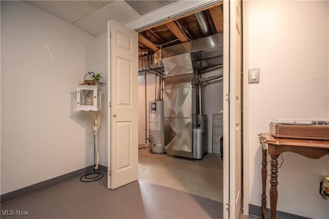 unfinished basement featuring gas water heater, visible vents, and baseboards