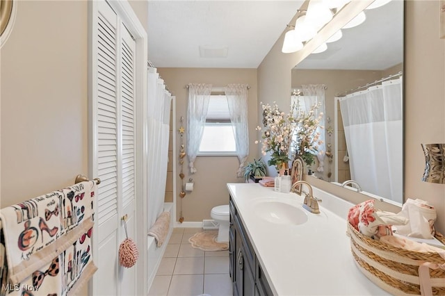 full bath with vanity, a closet, curtained shower, tile patterned floors, and toilet