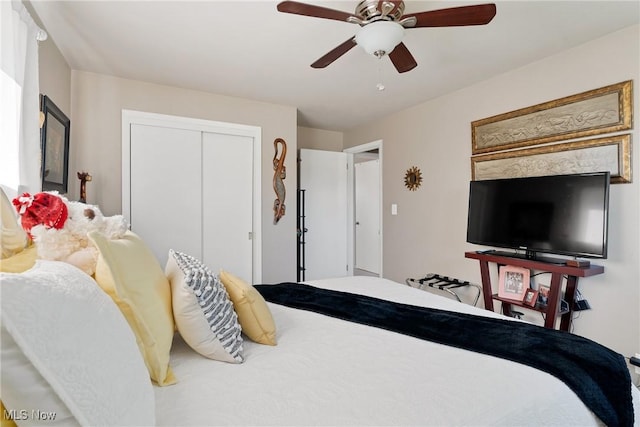 bedroom featuring a closet and ceiling fan