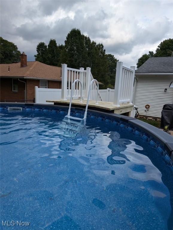 pool featuring fence