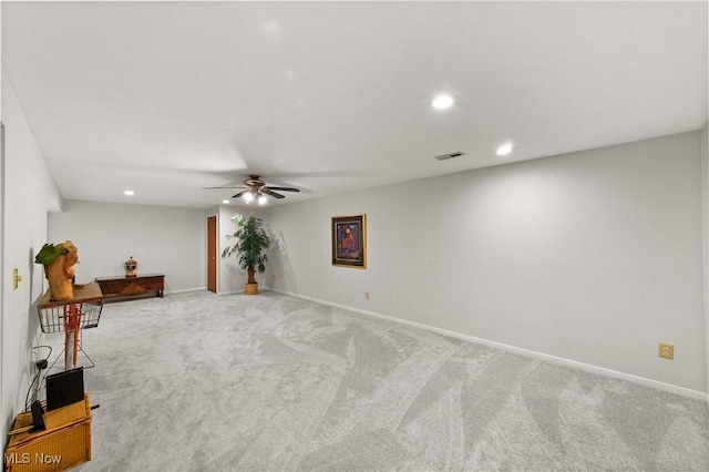 interior space featuring recessed lighting, visible vents, baseboards, and carpet flooring