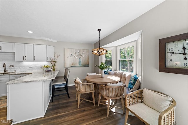 dining area with recessed lighting, dark wood-style flooring, and breakfast area