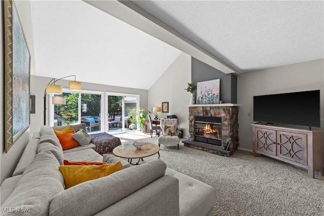 carpeted living area featuring a textured ceiling, a stone fireplace, and high vaulted ceiling