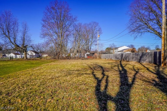 view of yard with fence