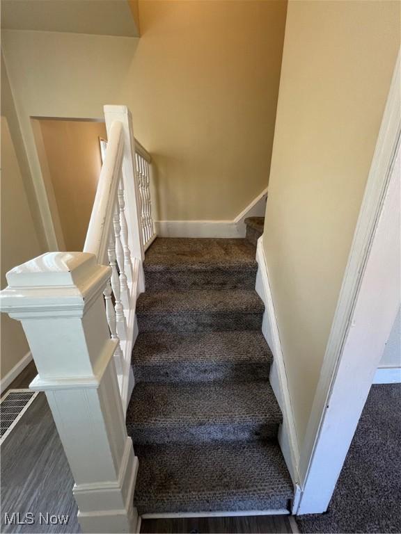 staircase with baseboards