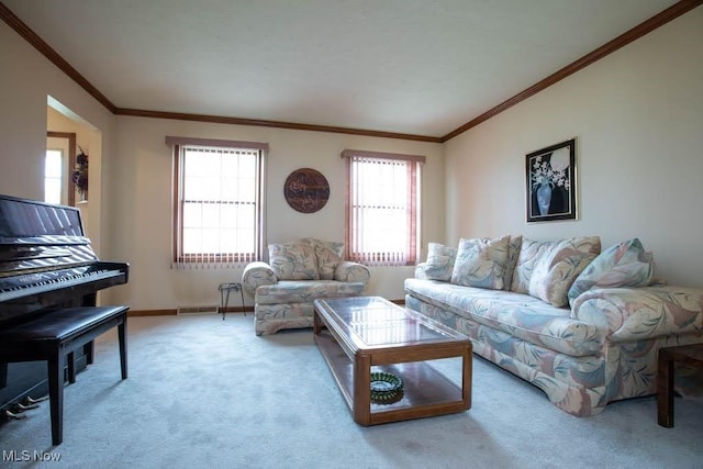 carpeted living room with baseboards and ornamental molding