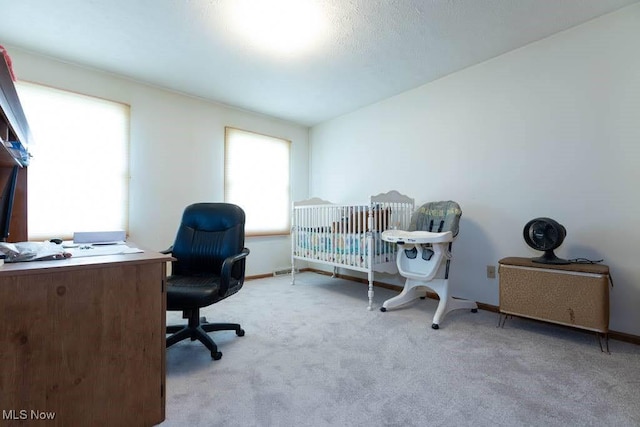 bedroom with carpet and baseboards