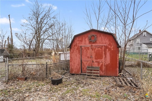 view of shed with fence