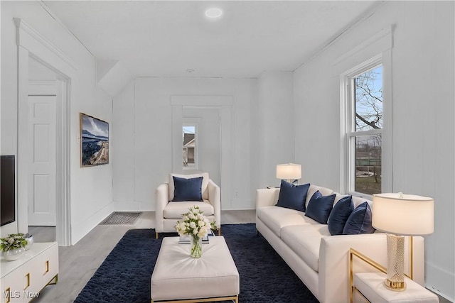 living room with wood finished floors