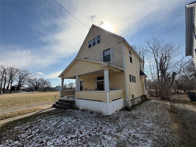 exterior space featuring covered porch