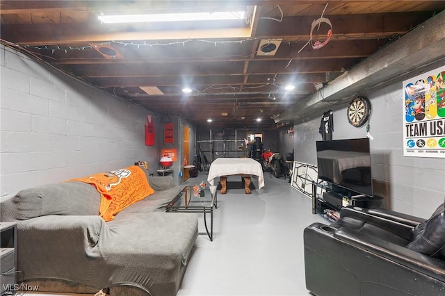 living room featuring concrete flooring