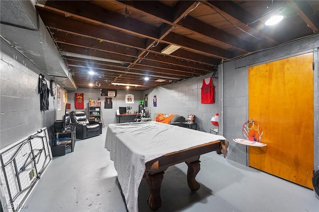 playroom featuring concrete flooring and billiards