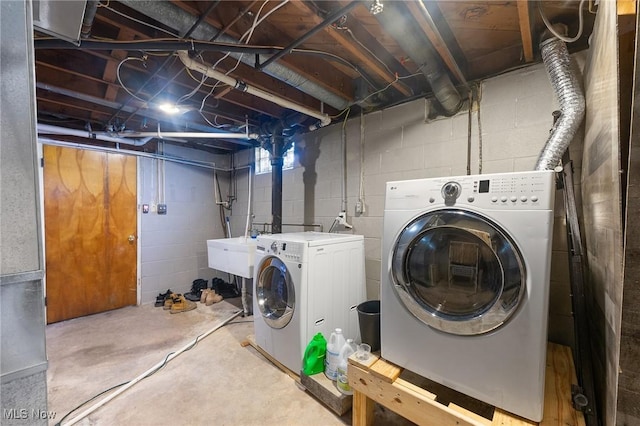 laundry room with laundry area and separate washer and dryer