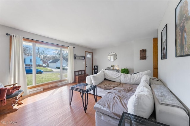 living area with wood finished floors and visible vents