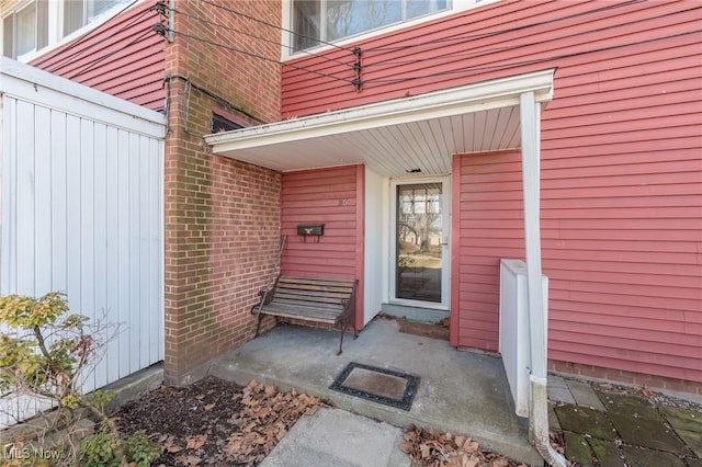 property entrance with fence