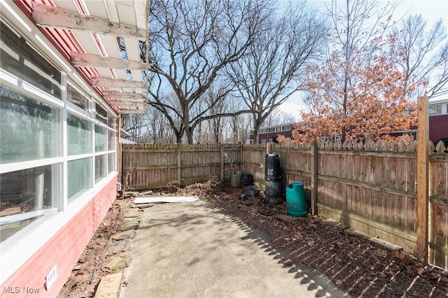 view of patio with a pergola and a fenced backyard