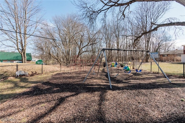 communal playground featuring fence