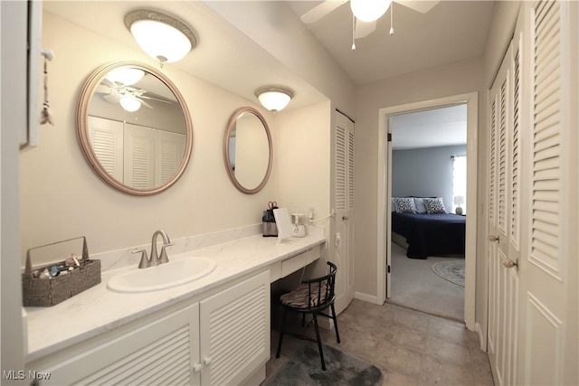 bathroom with vanity and a ceiling fan