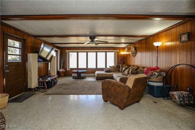 living area featuring a baseboard radiator, plenty of natural light, beamed ceiling, and ceiling fan