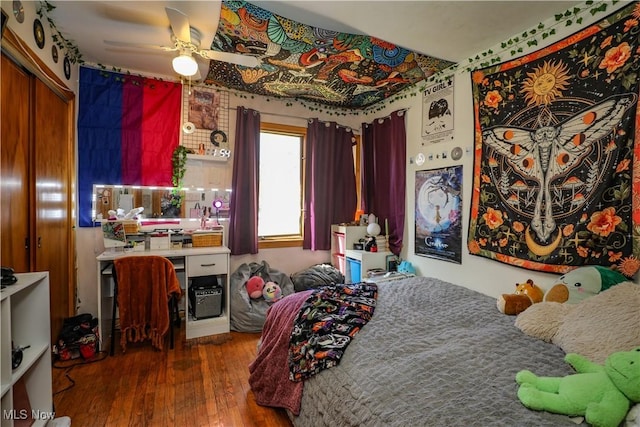 bedroom with hardwood / wood-style floors