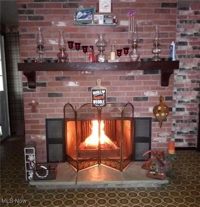 bar with a lit fireplace