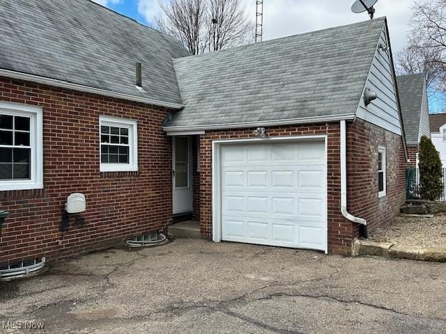 garage with driveway