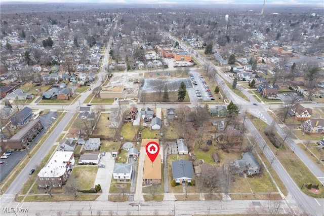 birds eye view of property with a residential view