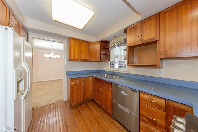 kitchen with a sink, open shelves, stainless steel dishwasher, white fridge with ice dispenser, and brown cabinetry