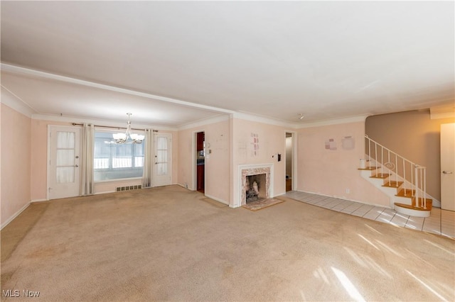 unfurnished living room with carpet, visible vents, a fireplace, stairs, and crown molding