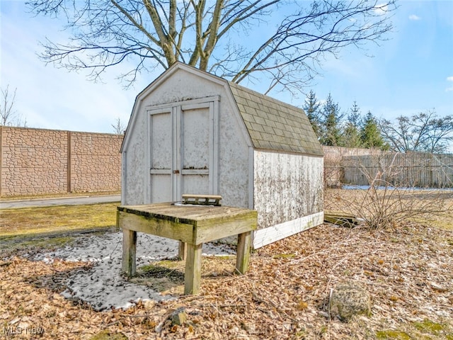 view of shed featuring a fenced backyard