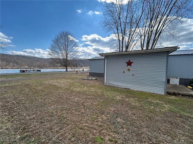 view of yard with a water view