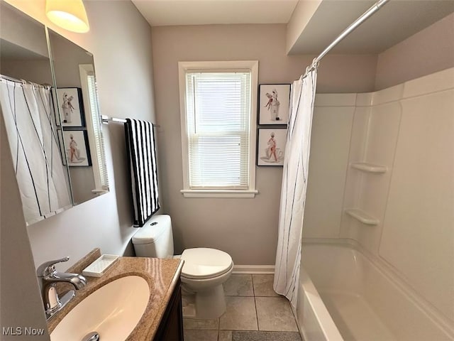 bathroom featuring baseboards, toilet, tile patterned floors, vanity, and shower / bathtub combination with curtain