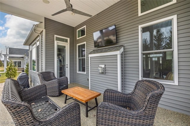 view of patio featuring ceiling fan