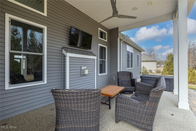 view of patio with a ceiling fan