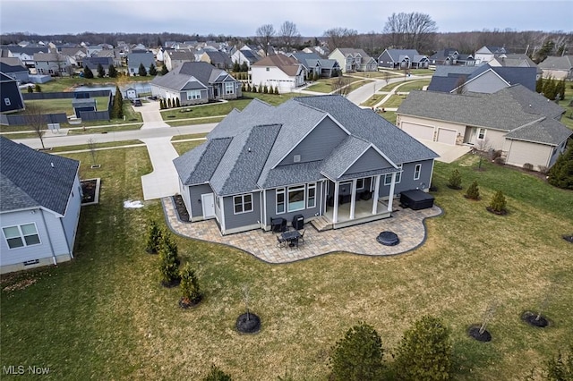 drone / aerial view featuring a residential view