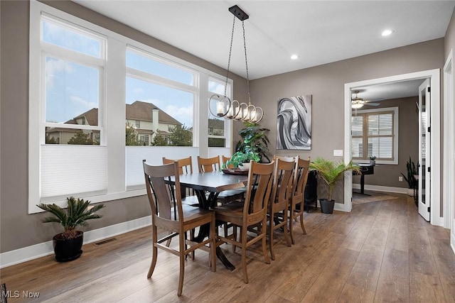 dining area featuring recessed lighting, visible vents, baseboards, and wood finished floors