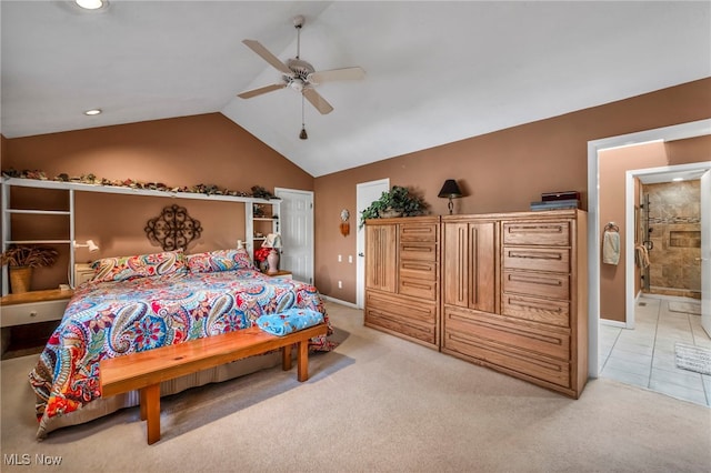 bedroom with light tile patterned floors, baseboards, lofted ceiling, ceiling fan, and light colored carpet