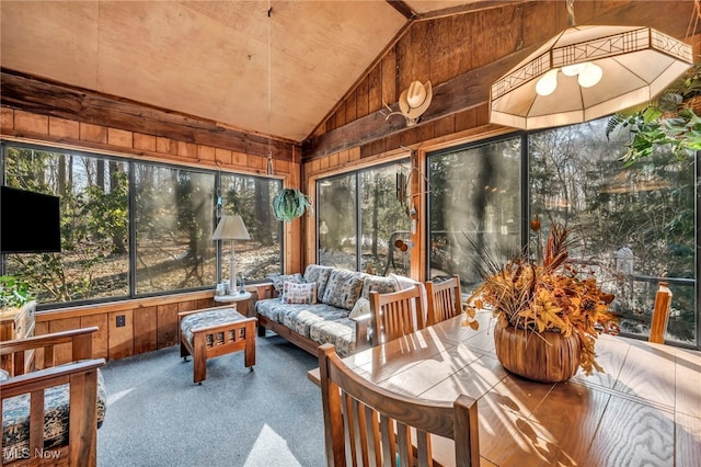 sunroom / solarium with lofted ceiling