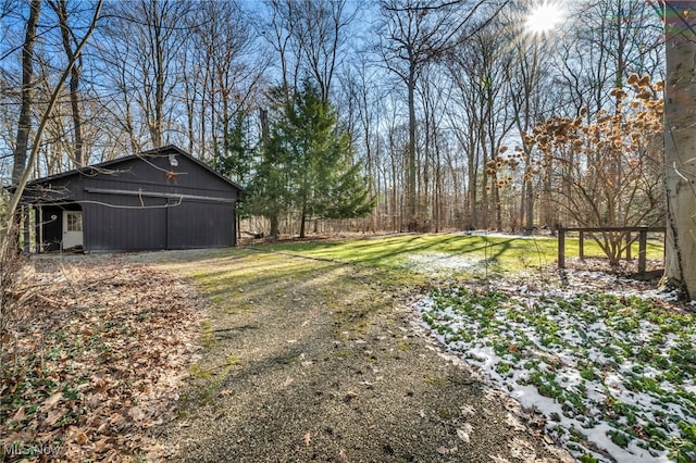 view of yard featuring an outbuilding and a pole building