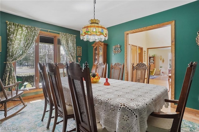 dining room with wood finished floors