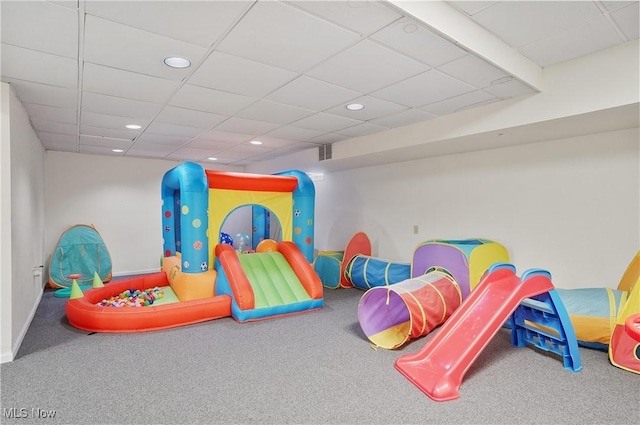 game room featuring carpet flooring, recessed lighting, a paneled ceiling, and visible vents