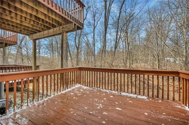 view of snow covered deck