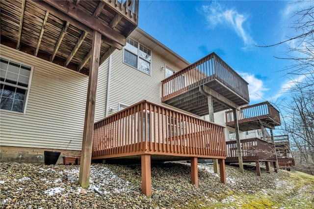 exterior space featuring a wooden deck